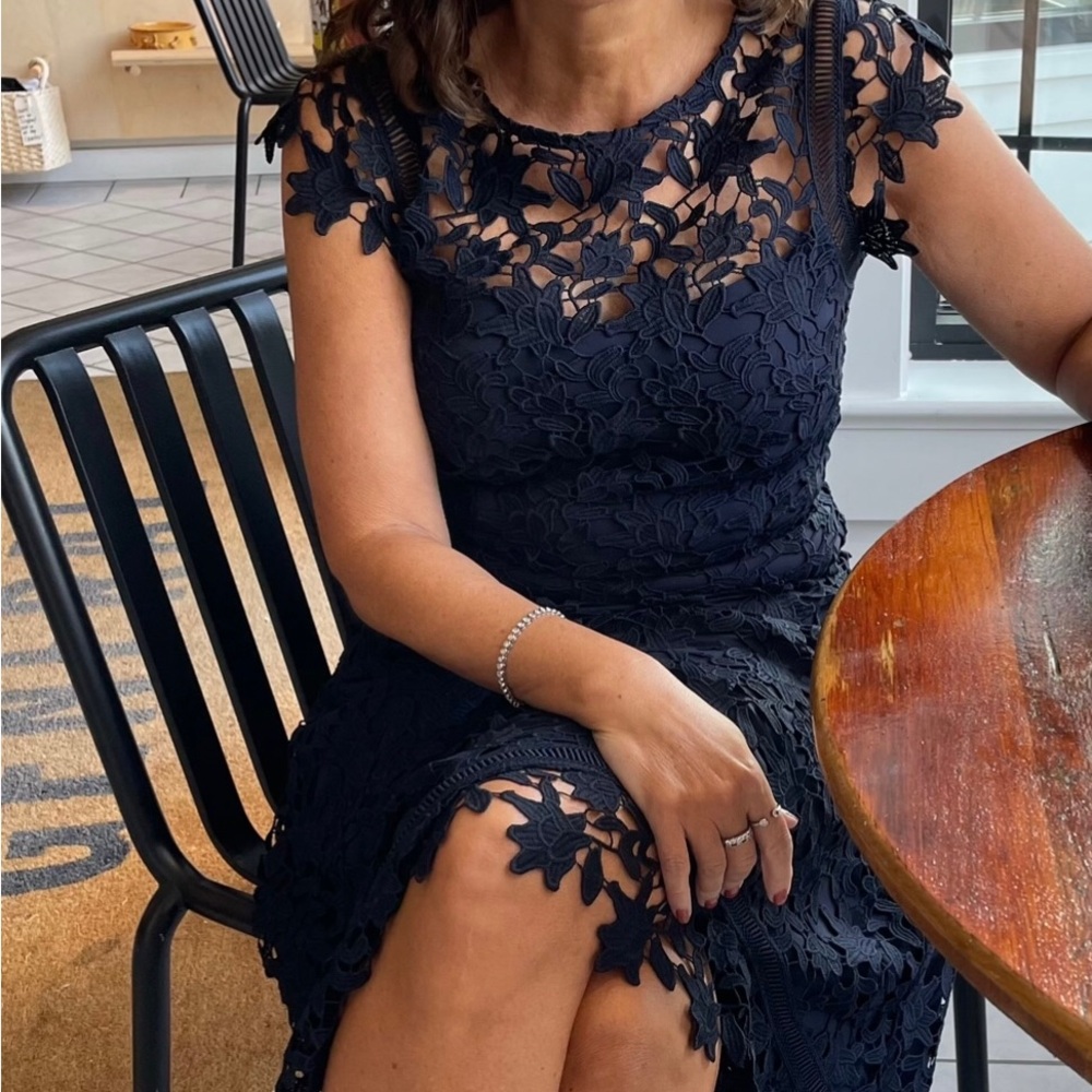 Dark navy asymmetrical lace dress.